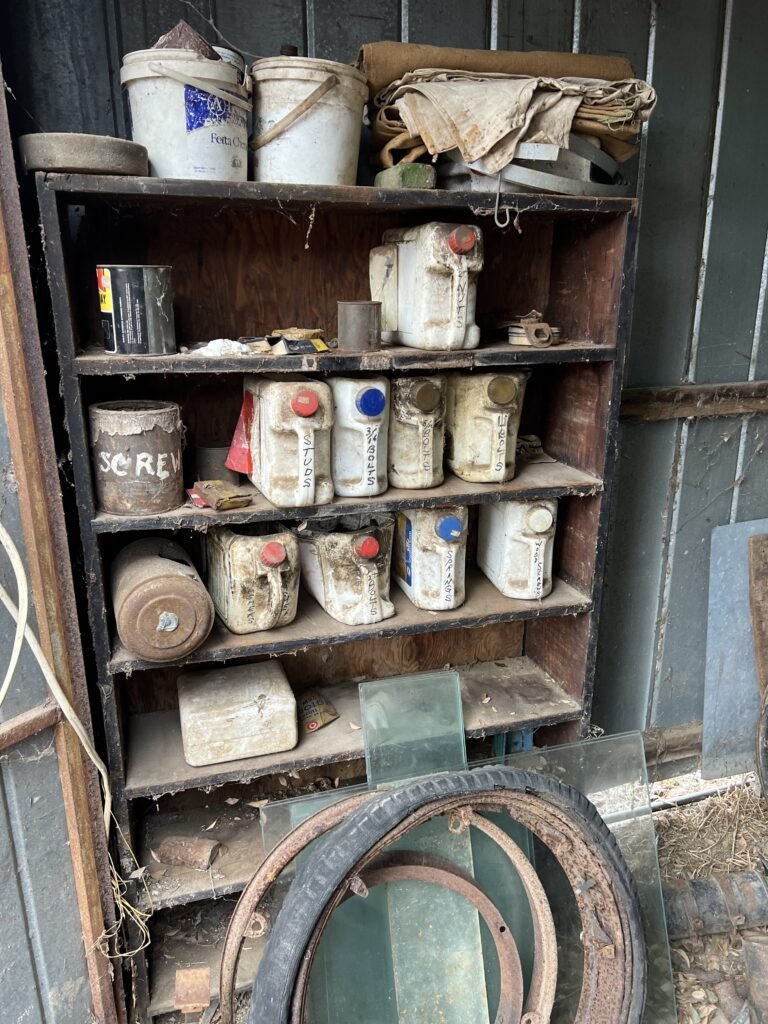 Containers of old bolts, buts, screws, etc. Collection from Veteran to 1980's.