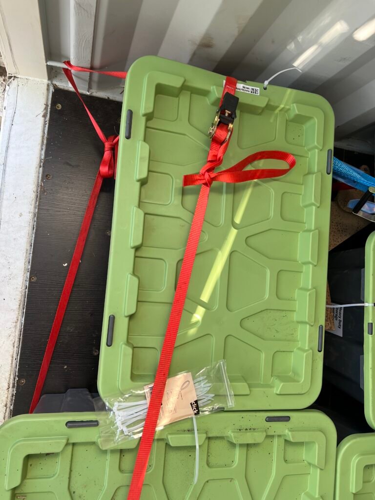 Tie-Down of tubs at rear of container