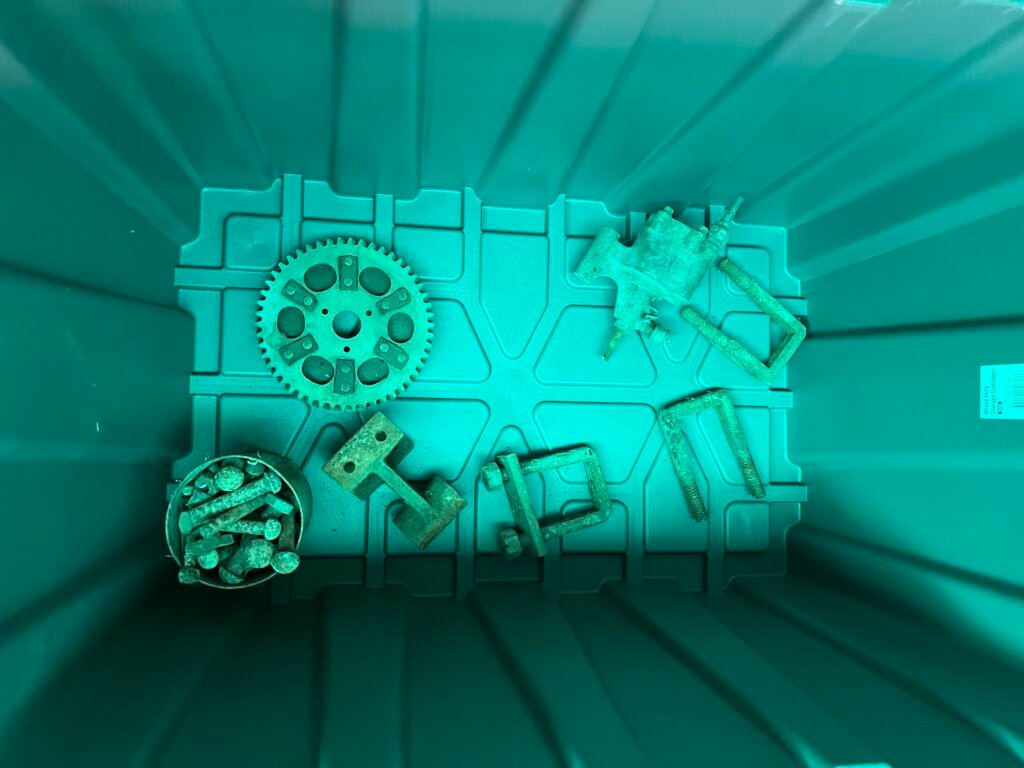 Hotchkiss and other car parts in tubs for shipping