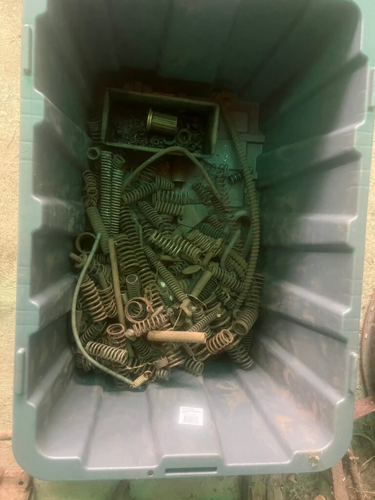 Hotchkiss and other car parts in tubs for shipping