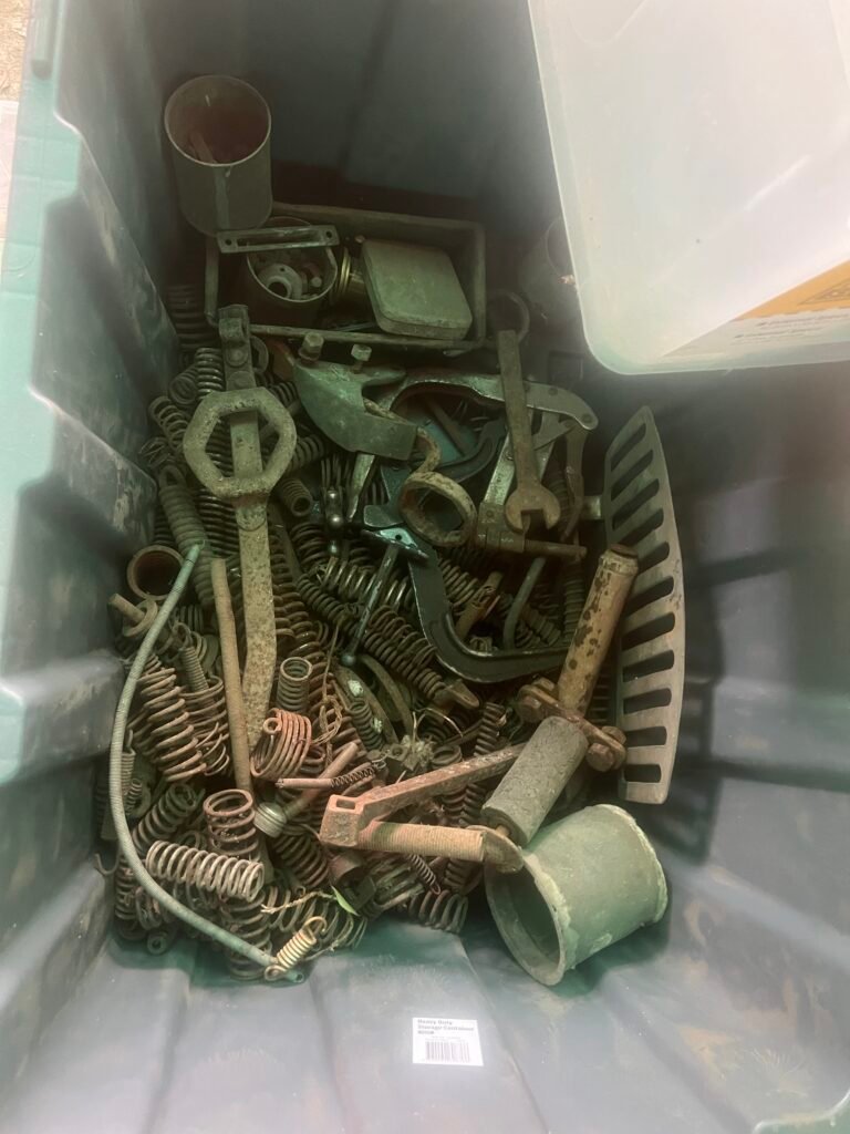 Hotchkiss and other car parts in tubs for shipping