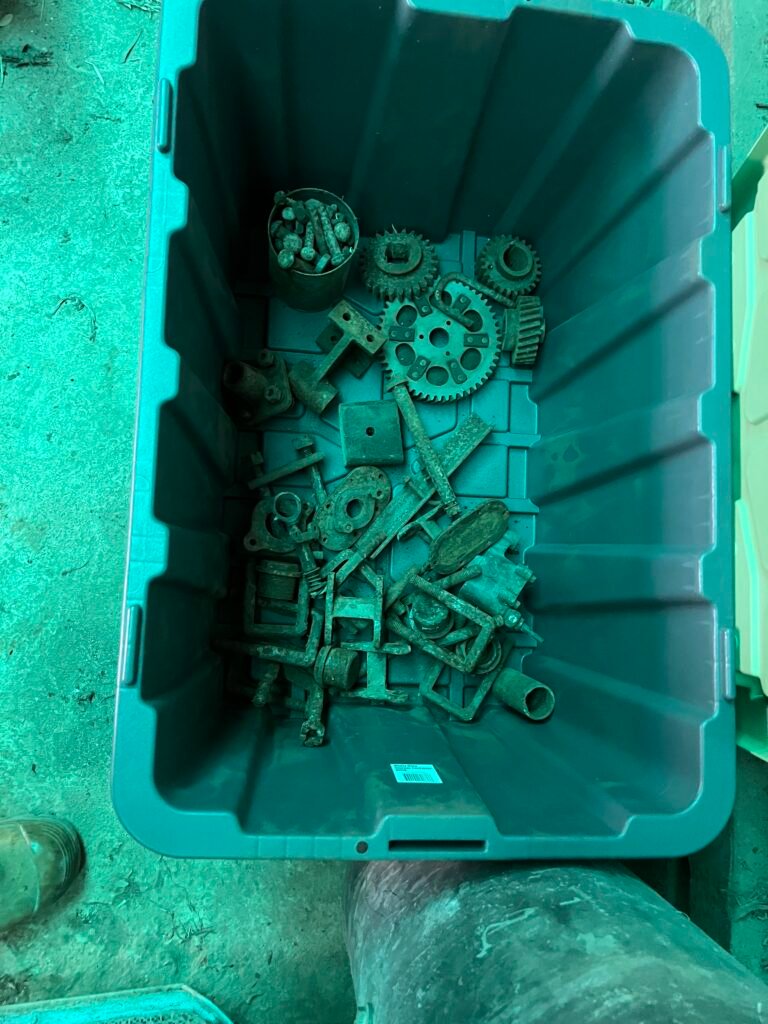 Hotchkiss and other car parts in tubs for shipping