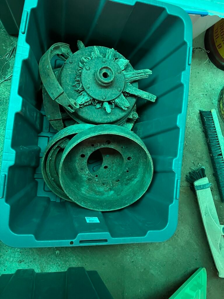 Hotchkiss and other car parts in tubs for shipping