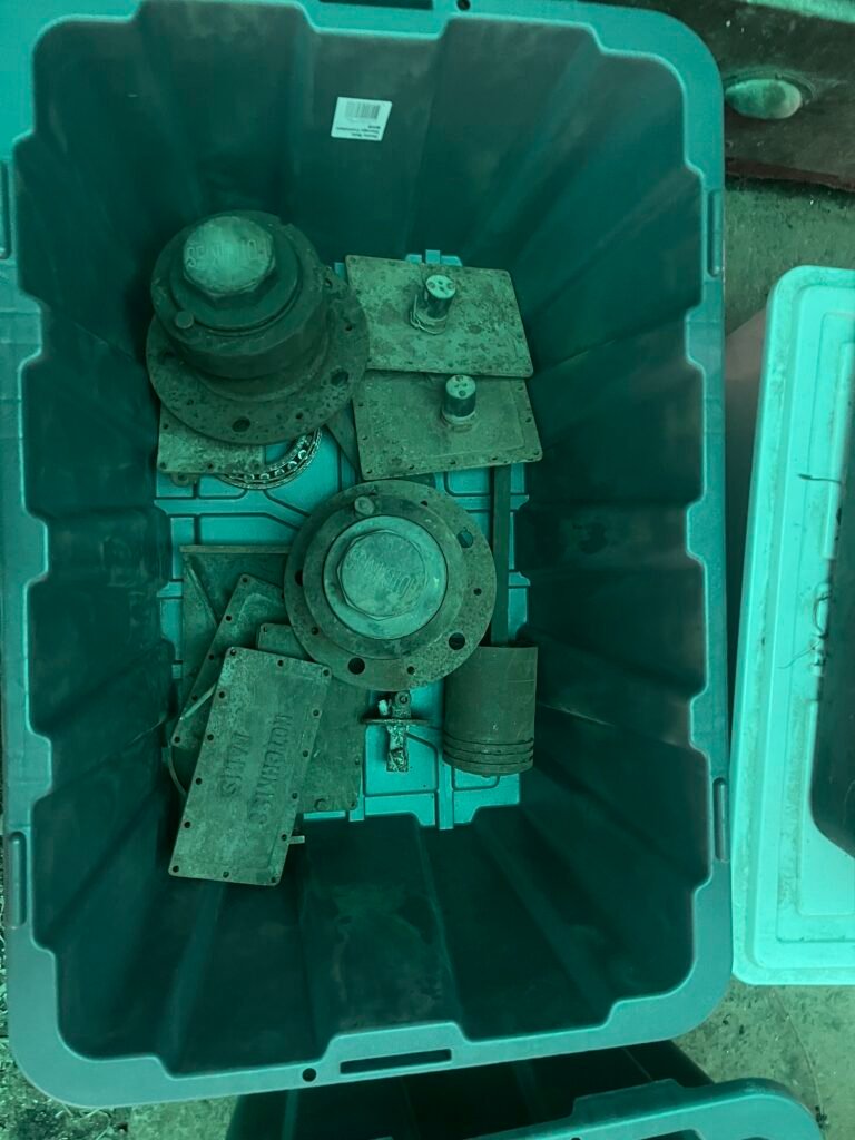 Hotchkiss and other car parts in tubs for shipping