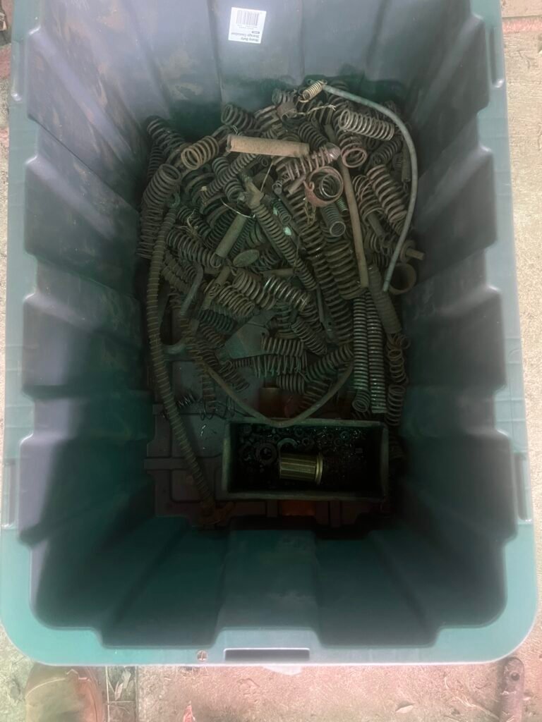 Hotchkiss and other car parts in tubs for shipping