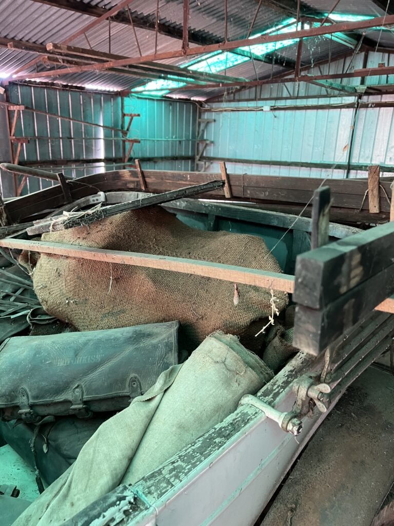 Rear of car before loading showing canopy hoop bending jig