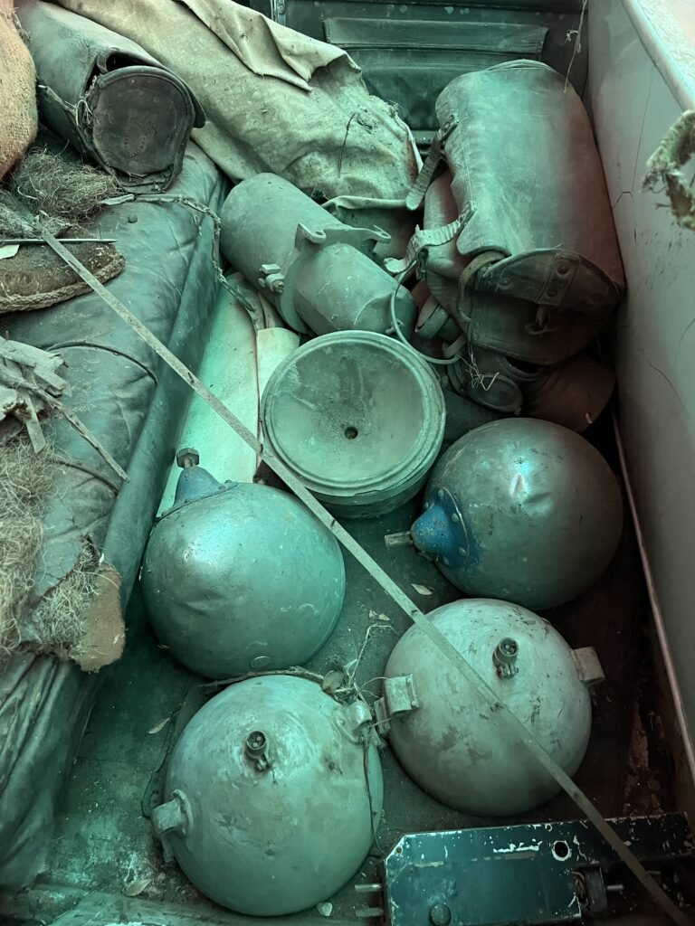 In rear seat section headlight shells on floor