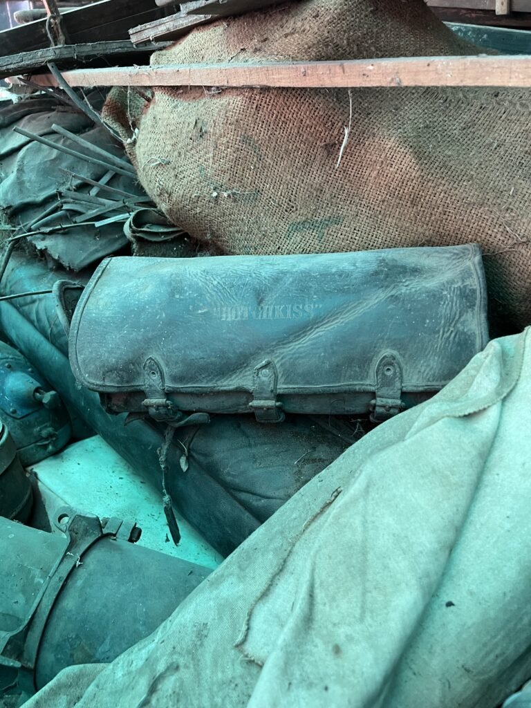 In rear seat section Hotchkiss branded tool bag