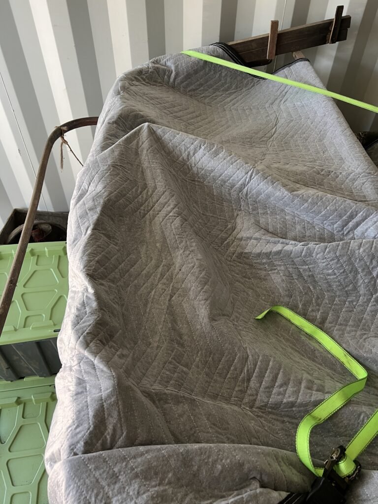 Hotchkiss Parts Placed in Car Cabin Covered with extra blankets and tie-downs