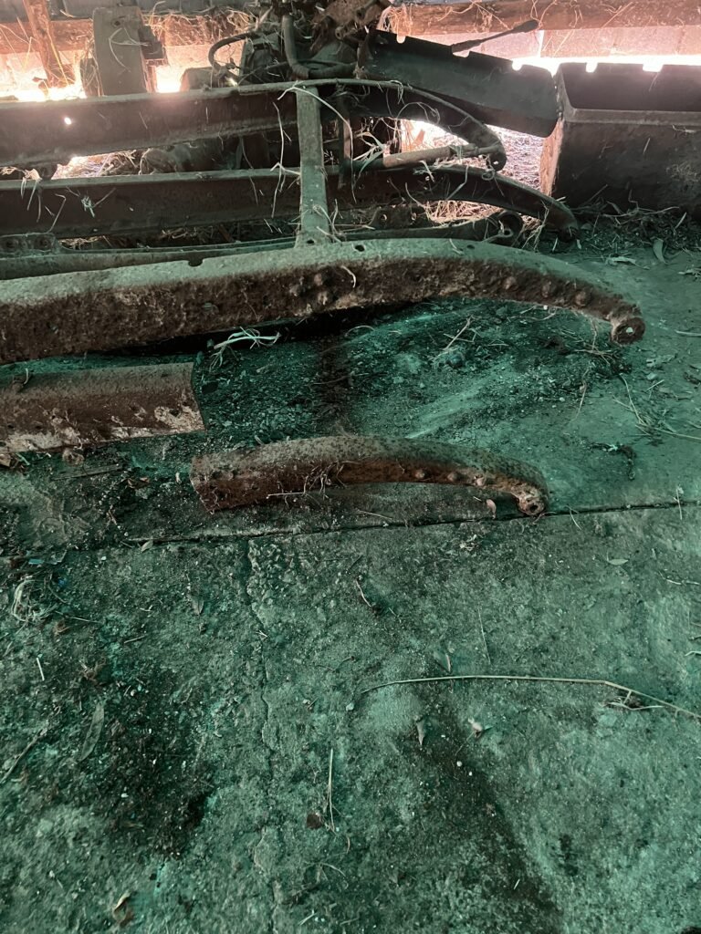 Shed Showing Loose Chassis with front section dismantled.