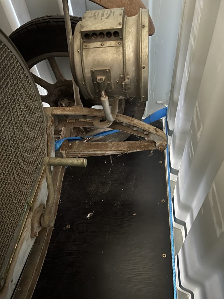 Container Front Axle Tie-Down Straps before Cardboard Packing