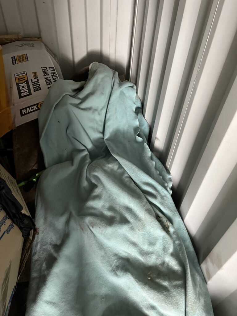 Container Front Right Side With Blankets to Dampen Movement